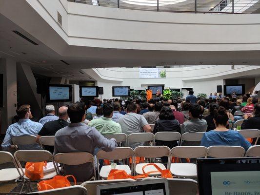 How many TVs is enough? Here are 8 large TVs (and audio gear) in a corporate meeting.