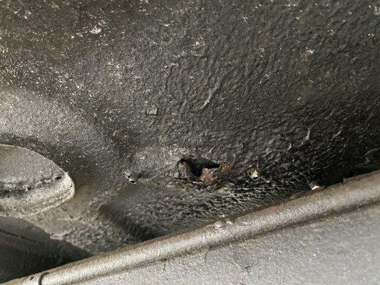 Rust Hole in drivers floorboard