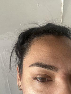 Eyebrow threading with medium brown tint