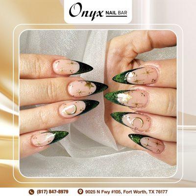 Embrace the glow with French green tips and a touch of sparkle. A stunning look that shines bright!