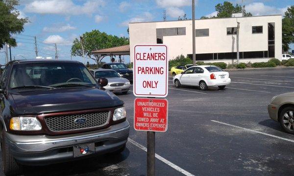 Close up of the new parking sign for Royal Cleaners patrons.