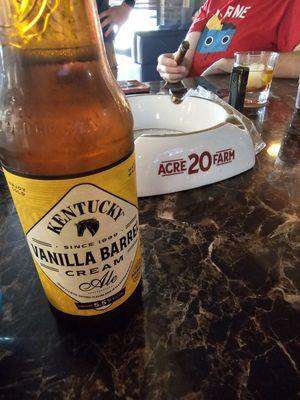 Kentucky Vanilla Barrel Cream Ale and a BIG ole cigar ash tray in the background.