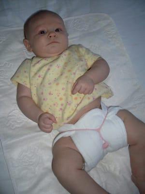 My tiddler in her Eco-Baby diaper (the Snappie's stretched out a bit)