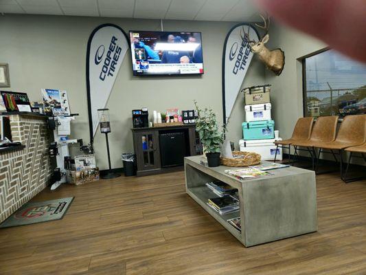 Coffee and a mini-fridge under the flat screen!