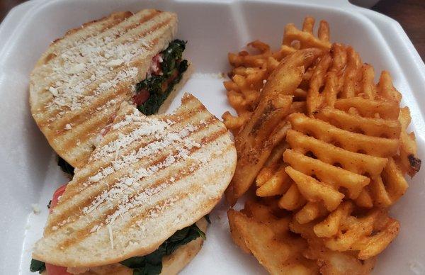 Veggie panini after I took a bite. And waffle fries. Get yourself pizza or turkey club instead.