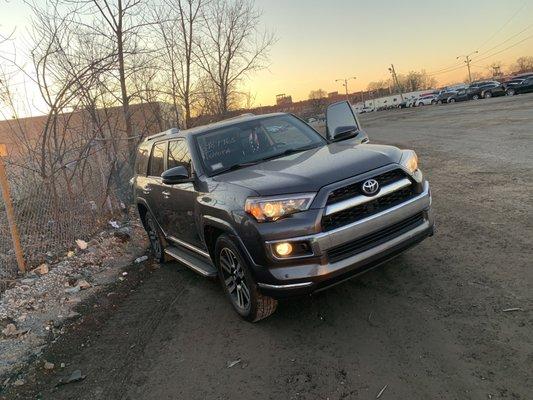 Exactly where and how they left my car after rolling it off the truck and NOT placing back into park.