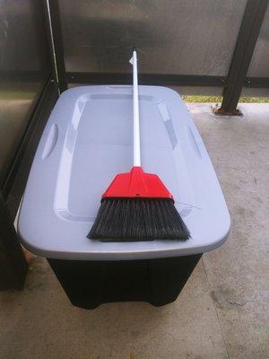 Storage box and broom