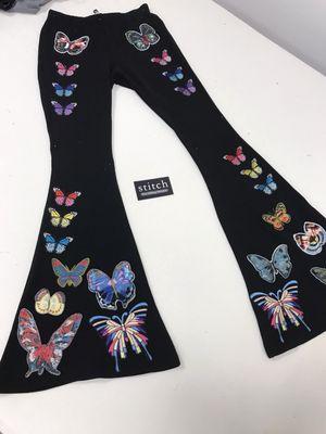 Butterflies were created and hand sewn to perfection on customer's plain black pants