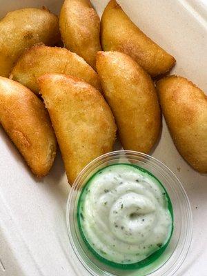 Mini empanadas with garlic cilantro sauce - summer menu 2024