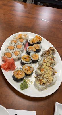 left to right: spicy crab, spicy scallop (seaweed outside), sweet potato roll