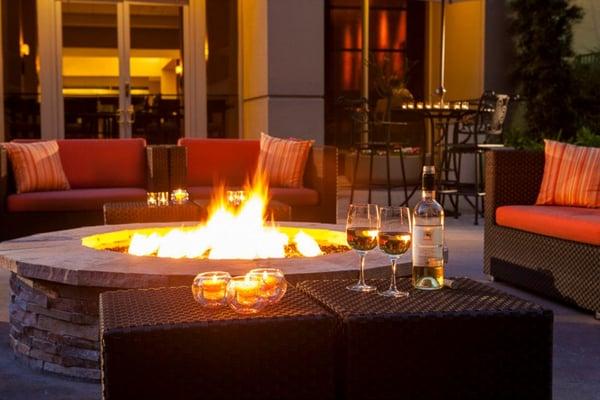 Patio area with firepit seating. Perfect for a romantic night out.