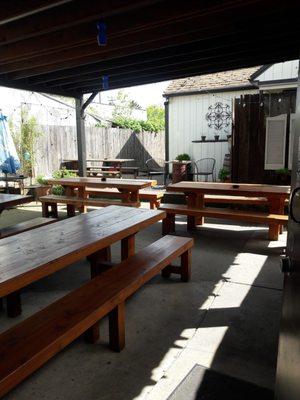 There are a lot of picnic tables.