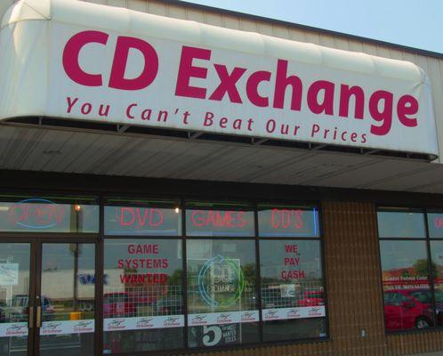 CD Exchange - the sign says it all, you can't beat their prices! They sell used video games, movies, music, vinyl - and they buy too!