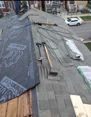 Halfway completion of shingle roof