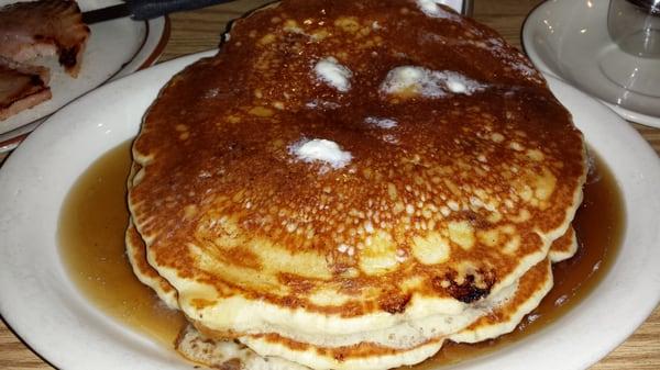 The absolute best blueberry pancakes in the world! They are huge, full of blueberries and are fluffy enough to lay your head on.