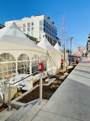 Outdoor dining tents. Too bad it's freezing cold