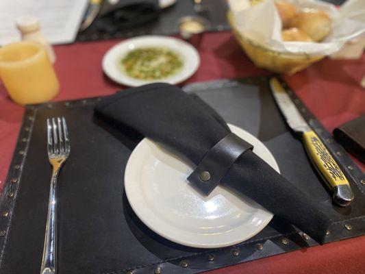 Place setting with bread & delicious dipping oil.