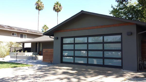 Aluminum framed, frosted glass modern style garage door.