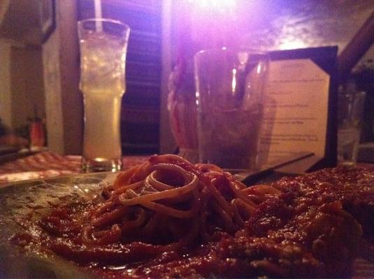 Eggplant parm and the towering Basil Smash in the background