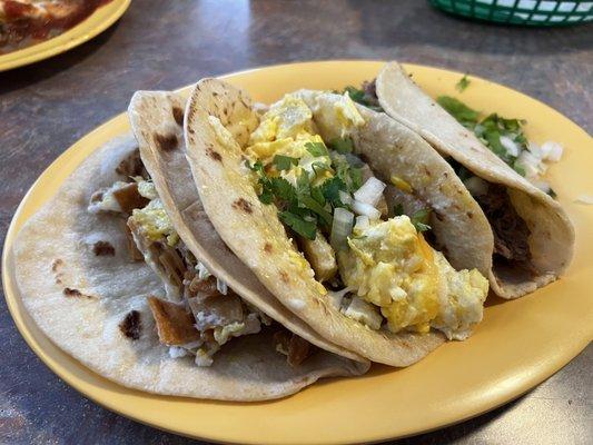 Migas, eggs and papas , Barbacoa tacos