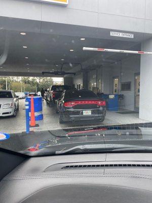 Getting a professional and affordable oil change at Jeep Dodge Ram in Arlington, Jacksonville.