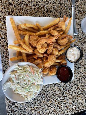 Fried shrimp, fries, and coleslaw