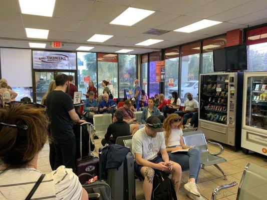 Folks waiting for 1 hour for a rental car. We also waited nearly 1 hour for the shuttle prior to arriving here