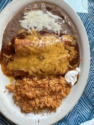 Enchilada Plate with delicious shredded beef enchiladas, refried beans, and rice. Yum!