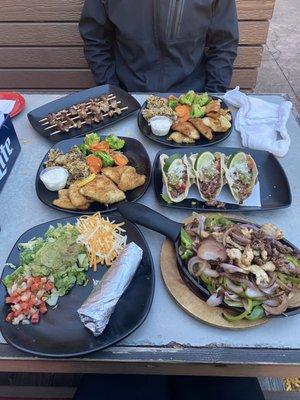 Steak and shrimp fajitas, street tacos, pork belly skewers, 2 sunfish platters