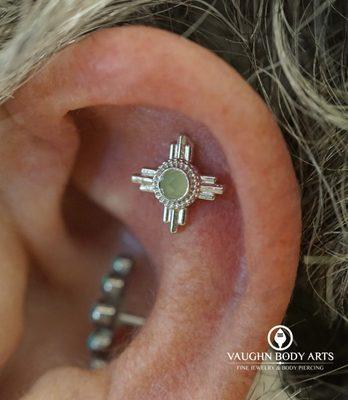 Helix piercing with a "Zia" end. 14k White Gold with a rose-cut Chrysoprase.