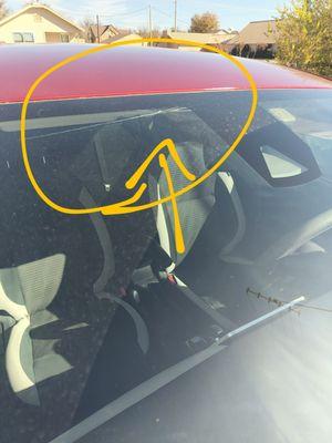 Windshield cracked with cracks going both directions.