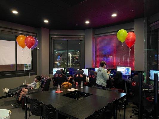 Party Room full of gamers having a great time