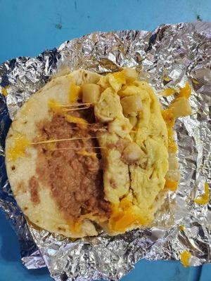 Breakfast pirata. Egg beans potato cheese on corn tortilla - corn tortilla was thick, but fresh