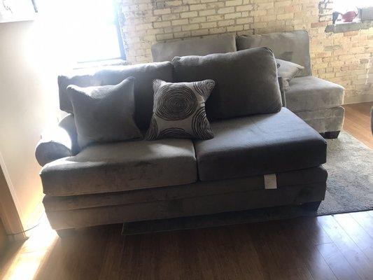 Two identical sides of the WRONG couch they left in my apartment even though I told them it wasn't mine...