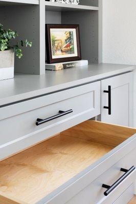 Beautiful gray finish, shaker style cabinetry, Murphy Bed home office design.