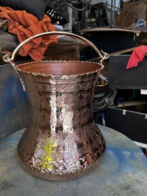 A bucket re-polishing and lacquer it