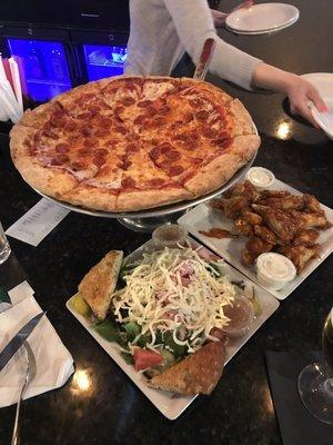 Pizza, hot wings, and antipasto salad