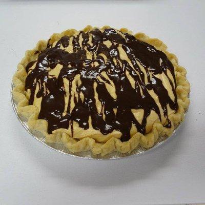 Our famous Peanut Butter Pie with hot fudge topping!