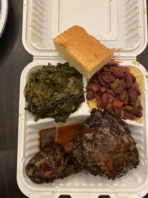 Jerk Chicken, mixed greens & Red Beans and Yellow Rice