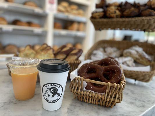 Fresh orange juice and Delicious Latte with a Wide selection of pastries.