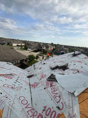 Taking off the damaged roofing