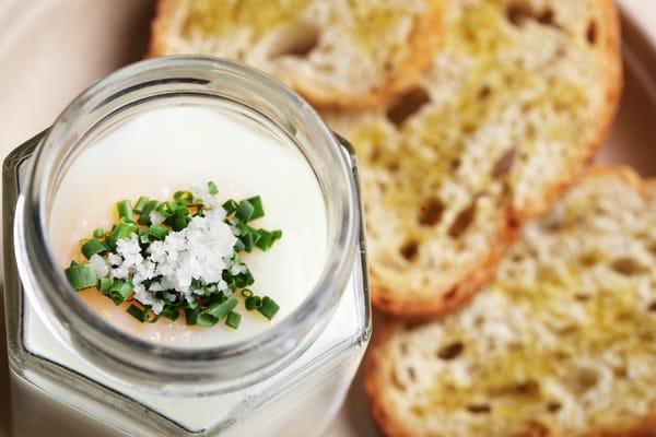 Slut (cage-free coddled egg, 
 potato purée, gray salt and chives,
 served with slices)