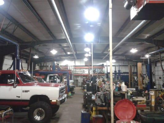 The inside of the shop.  We have 12 bays to help serve you and service your vehicle!