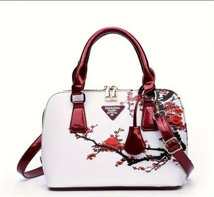 Discover a blend of charm and practicality with the Elegant Stylish Floral Print Boston Bag.