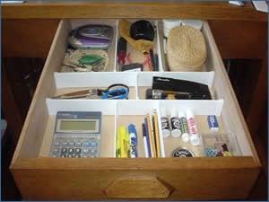 Organized... right down to the details! We never shove things in drawers - instead, we create effective, easy storage.