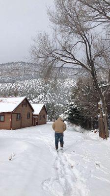 View of the mountains from Jemez Canyon Inn. A couple of her cabins in the background.