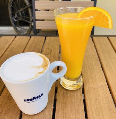 Cappuccino and a fresh squeezed orange juice.