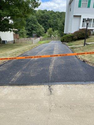 Castle's workmanship - NEW driveway and lowered curb