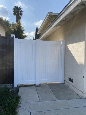 Front gage door. Clean and elegant looking. Saddleback covers the gap for me for privacy, that's exactly what I needed!