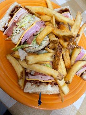 The Big Club Sandwich with side order of fries.